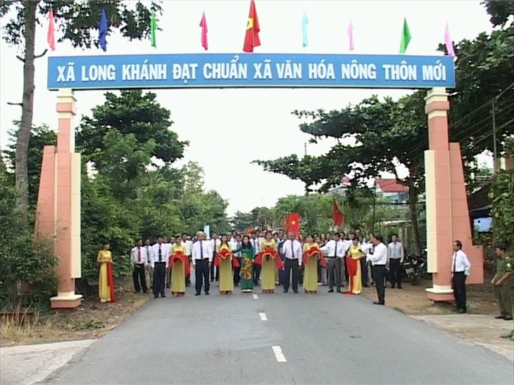 ឃុំជិត២០០០ទទួលបានបទដ្ឋានជនបទថ្មី - ảnh 1